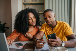 Influencer couple doing taxes online