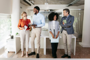 Business people collaborating using digital tablet in modern office